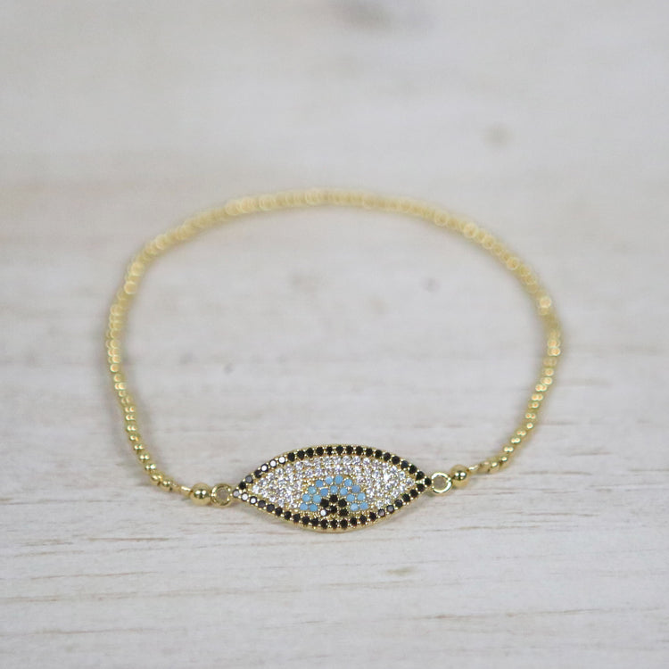 Elasticized gold bracelet with evil eye stone 2 per pack FJ002B