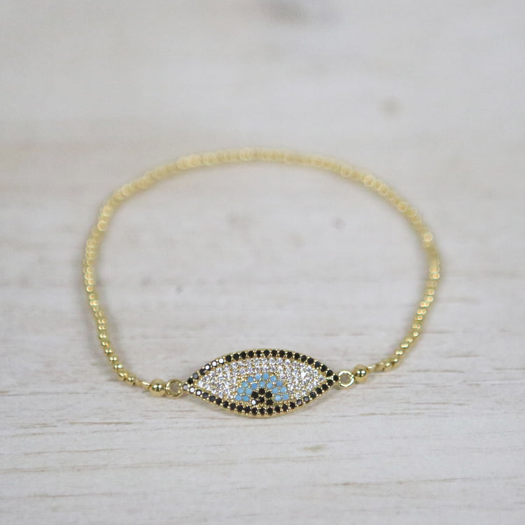 Elasticized gold bracelet with evil eye stone 2 per pack         FJ002B