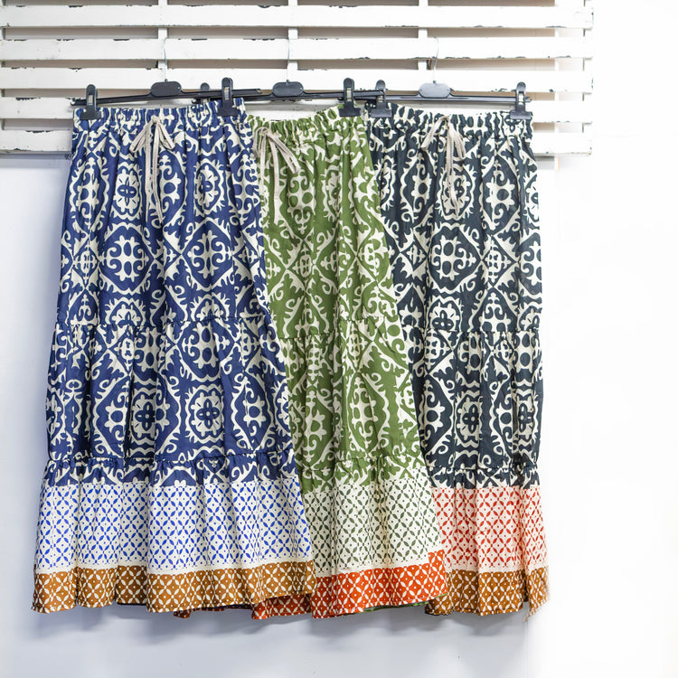 Black cotton printed skirt with draw string 2 per pack                           CGM080BL