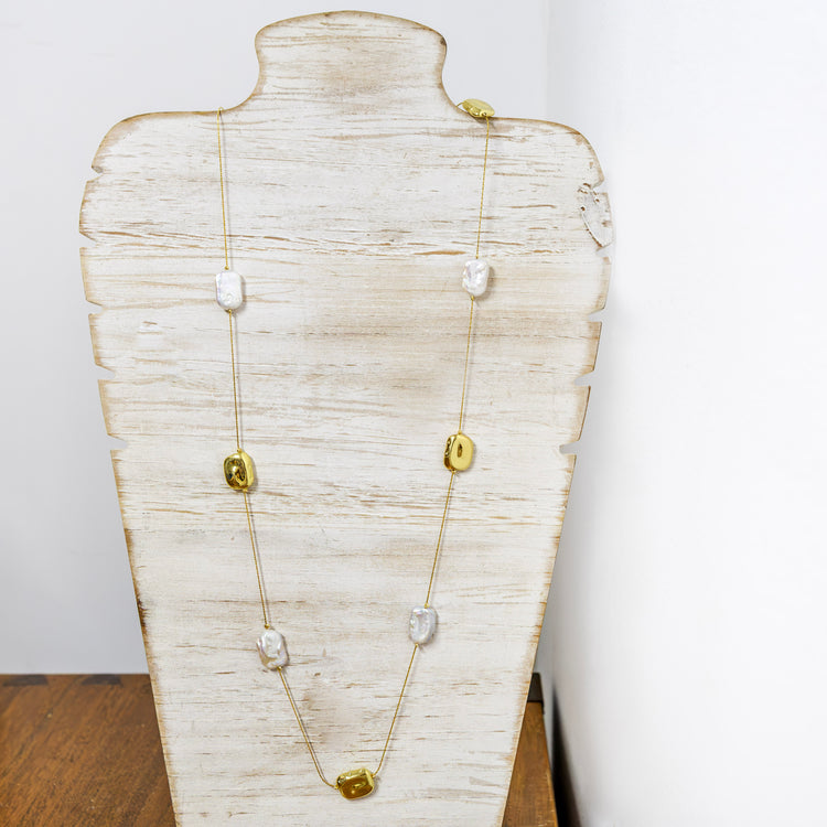 Long gold plated necklace with fresh water pearls and gold plated charms 2 per pack G63882