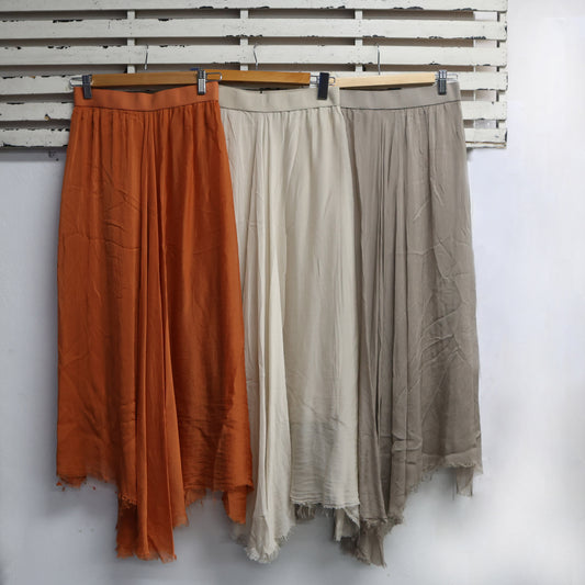 Burnt orange silk blend skirt with elastic band waist and frey hem 2 per pack G67374BO