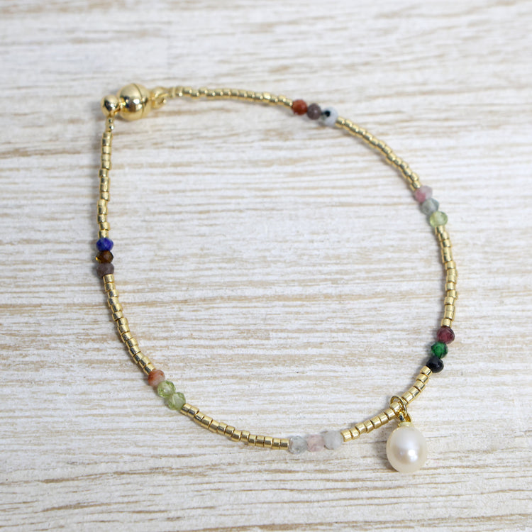 Rhodium plated bracelet with magnetic clasp and crystals with hanging pearl 2 per pack TFA61847