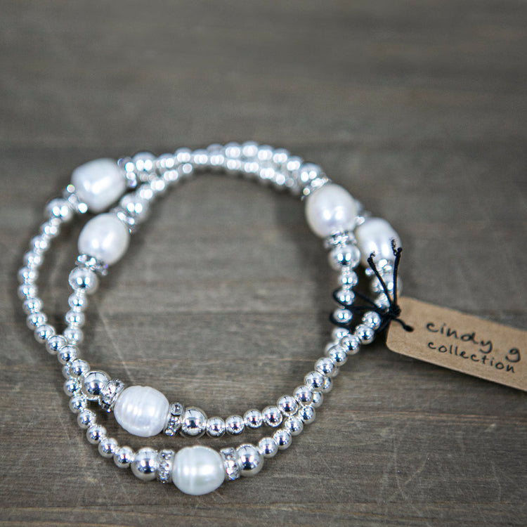 Double bracelet in rhodium silver with silver balls and fresh water pearls 2 per pack