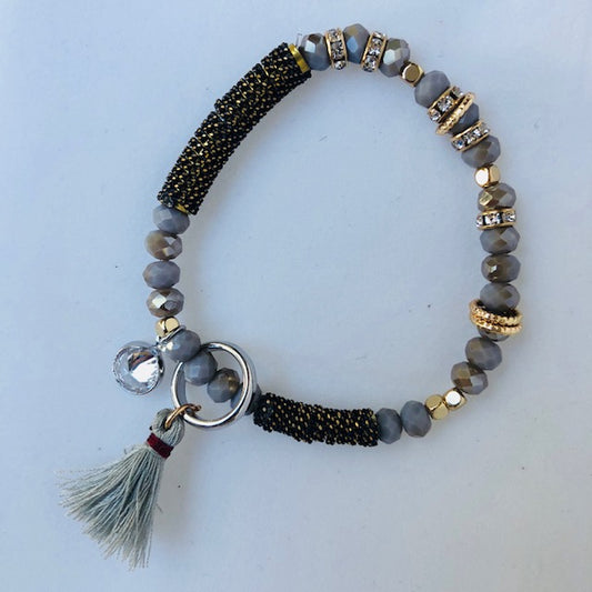 Grey crystal bracelet with rose gold diamante and grey tassels and charms 2 per pack